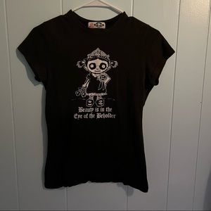 Sally’s Sweet Revenge “Beauty is in the Eye of the Beholder” Tee